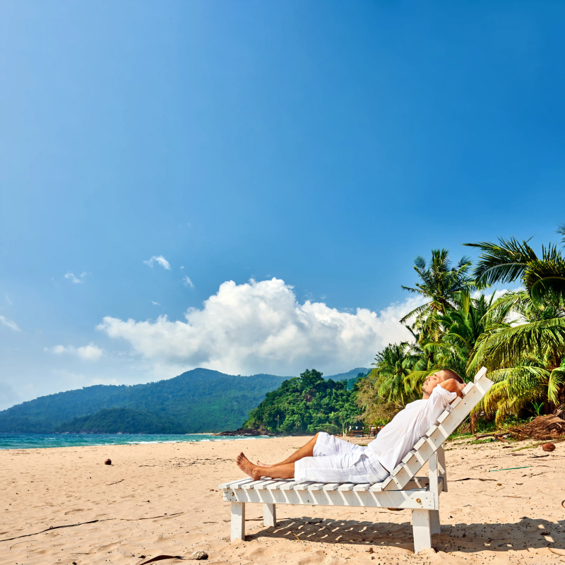man-in-white-relaxing-in-sun-bed-on-beach-2026-03-09-23-57-21-utc